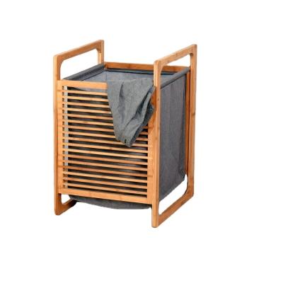 China Traditional Bamboo Basket Storage Basket Laundry Bathroom Hamper Wooden Basket for sale