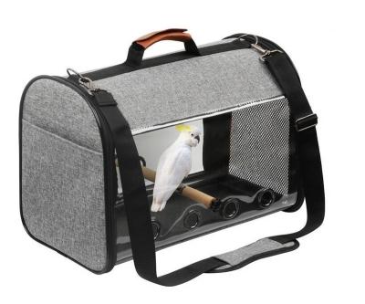 China Waterproof Portable Parrot Carrier Bird Travel Bird Pet Bag Transparent Breathable Breathable Cage for sale