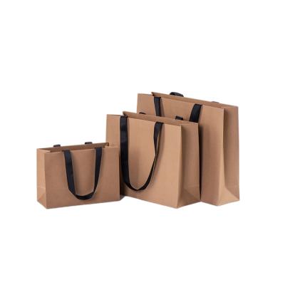 China Recyclable Recycled Recyclable Brown Rope Handle Kraft Paper Customized Packing Bags For Food for sale