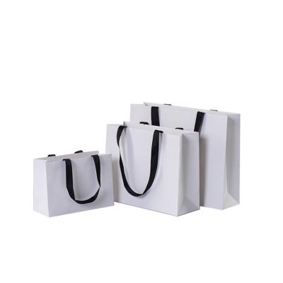 China Recyclable Reusable Shopping Paper Bags Logo Printed Brown Or White Kraft Paper Packaging Bag For Food for sale