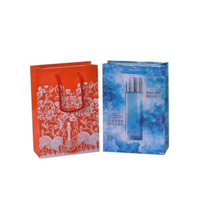 China Colorful Recyclable Branded Custom Shopping Cosmetic Printed Drawstring Gift Paper Bags With Handles for sale