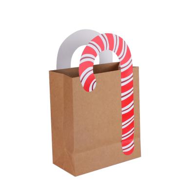 China Recyclable Wholesale Christmas Party Brown Bulk Gift Packaging Paper Bag With Logo for sale