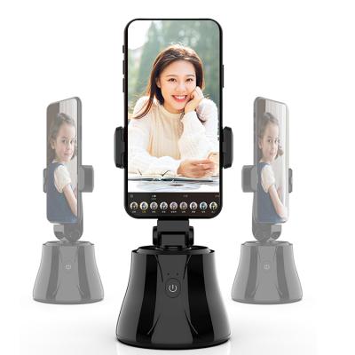 China 2021 Adjustable Smart Auto Tracking Phone Holder 360 Degree Rotation Track Mount Body Face / Tracking Tripod For Vlog Live Stream for sale