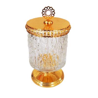 China Household products new design glass bottle candy jar dried fruit storage jar with metal appearance cosmetics stretch houseware bulk transparent for sale