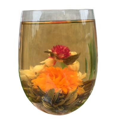 China Chinese blooming tea hot sale wholesale beautiful flower hand-made tea flower art blooming tea ball for sale