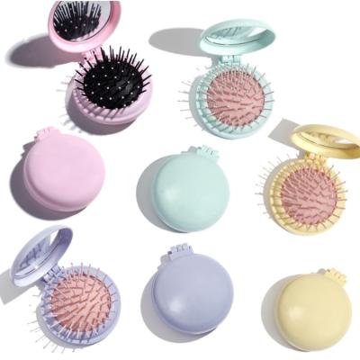 China Home Beauty and Personal Care Styling Comb Hair Salon Folding Massage Comb Brush with Mirror for sale