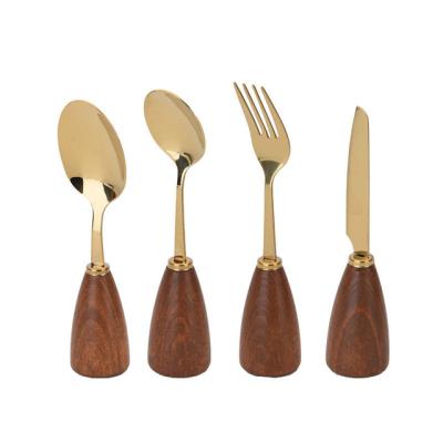 China New Viable Creative INS Handle Knife Wooden Spoon And Fork Set Western Tableware Gift Stainless Gold Set for sale