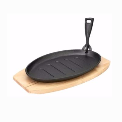 China Mordern Customized Restaurant and Hotel Hot Day Oval Oval Steak Dish Cast Iron Fajita Sizzling Pan for sale