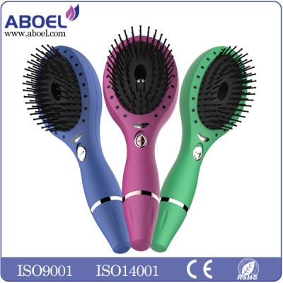 China Battery Operated Ionic Hair Brush , Portable Female Hair Care Comb for sale