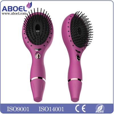 China Vibrating Massage Ionic Hair Care Comb With Battery Operation for sale