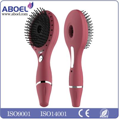 China Red Anion Salon Ionic Hair Comb Battery Operated With Laser Light for sale