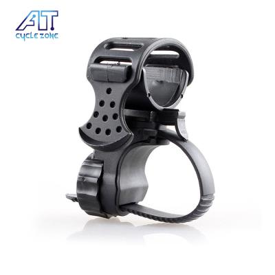 China 360 Rotation Universal Equipment Diameter Flashlight Torch Head Mount LED Light Holder Clip Rubber Cycling Tactical Accessories for sale