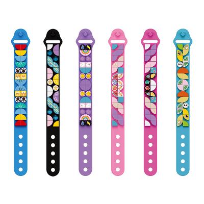 China Toy Creative DIY Dots Bricks Kids Adjustable Length Bracelet Wristband building block children toys watch Toy Building Blocks for sale