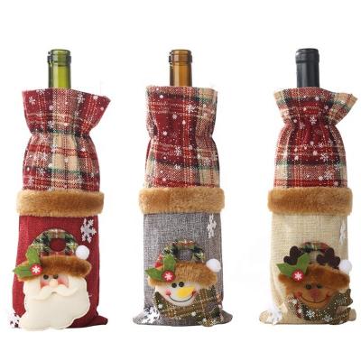 China Festival Stuff Wholesale Grid Santa Claus Christmas Wine Bottle Canvas Cover For Christmas Dinner Table Decorations for sale