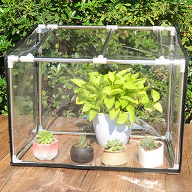 China Easily Assembled Transparent PVC Heater Mini Greenhouse For Vegetable Flowers Waterproof Plants Grow Box Tent for sale