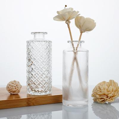 China Home Decorate Luxury Design Round Aroma Bottle Round Embossed Empty Diffuser Bottle For Sale for sale