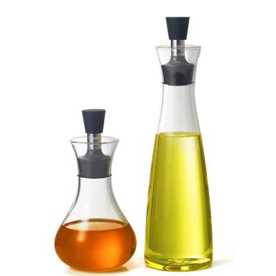 China Sustainable New Design Kitchen And Clear Glass Bottle Edible Oil Dispenser For Cooking With Stainless Steel Spout for sale