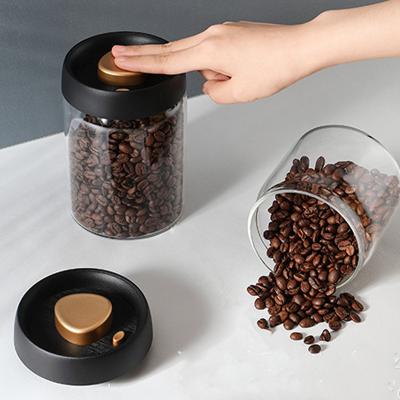 China Freshness Preservation Multi Size Borosilicate Glass Top Sealed Storage Container Vacumn Jar With Black Plastic Lid for sale