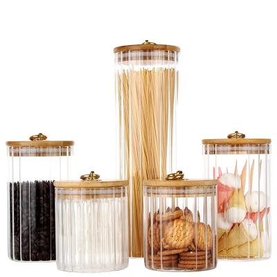 China Freshness Preservation Customized Creative Design Glass Storage Jars With Bamboo Ring Lids For Snack Honey Tea /Coffee for sale