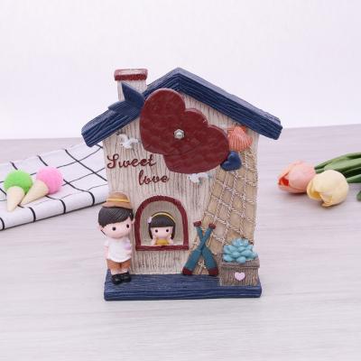 China Cute musical statue boy and girl couples toy figure home decoration cajata cajata sculpts figurine for gift wedding for sale