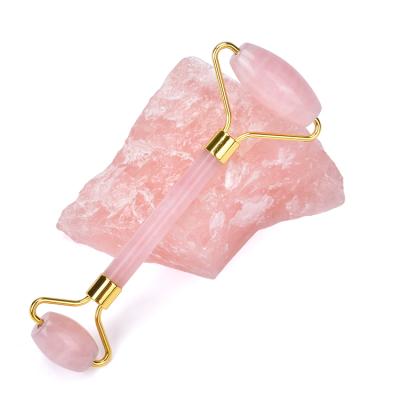 China Portable/Durable/Washable 100% Natural Silent Pink Jade Roller Dual Facial Mounted Quartz Roller for sale