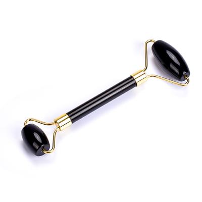 China Stong Frame/2021 Handheld/Durable/Washable Black Obsidian Massager Beauty Dragonglass Stone Roller For Remove Toxin for sale