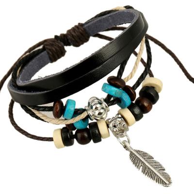 China 2020 New Vintage Feather Charm Bracelet Woven Genuine Leather Men's Handmade Leather Charm Fashion Jewelry Jewelry for sale