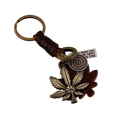 China Personal Adornmen Europe and American Punk Jewelry Alloy Maple Leaf Genuine Leather Key Chain Pendant for sale