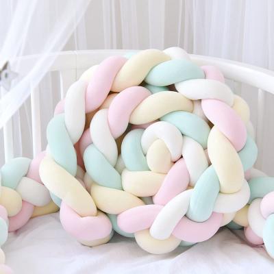 China Handmade Soft Folded Baby Crib Cushion Knot Soft Pillow Cushion Decor For Bedroom Baby Braided Cushion for sale