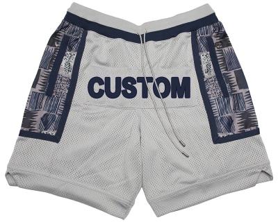 China Wholesale Custom Antibacterial College Vintage Mesh Logo Antibacterial Team Sublimated Streetwear With Zipper Pockets Retro Kids Mens Basketball Shorts for sale