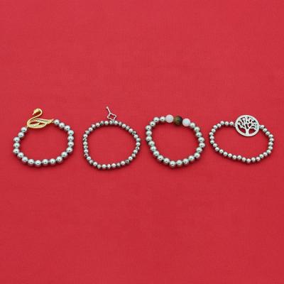 China CLASSIC Silver Plated Stainless Steel Pearl Gold Swan Hollow Zircon Doorstep Tree Pendant Natural Stone Bracelet for sale