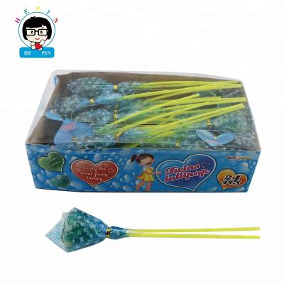 China Natural Custom Blue Heart Shaped Lollipop Candy Assorted Fruity Hard Candy Flavor Lollipop With Sticks for sale