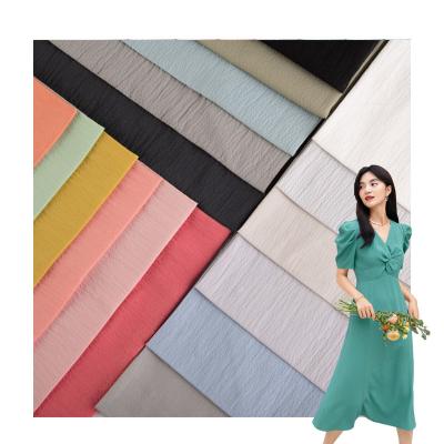 China Stretch Stock Lot Fabric Roll Cotton Fabric Wrinkle Crepe Nylon Spandex Cotton Fabric For Dress And Pants for sale