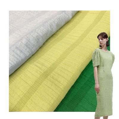 China Stocklot breathable garment cotton seersucker rayon plain dyed fabric by the yard for sale