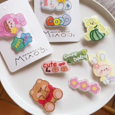 China Cute Cartoon Soft Hairpin Children Kid Cuts Bear Frozen Rabbit Girl Acrylic Hair Clip Sets for sale