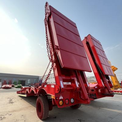 China Latest mechanical type 3 axle heavy duty lowbed ramp trailers low transport trailer for sale