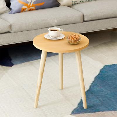 China Simple white natural wood living room coffee table special offer round white glossy solid wood coffee table with solid three leg for sale