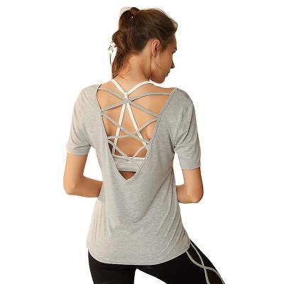 China 2021 New Style Cavity Back Breathable Korean Yoga Tops Quick Dry Cross Yoga T-shirts For Women Loosely for sale