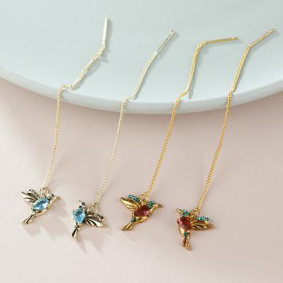 China Wholesale Fashion Alloy Jewelry Fashion Bird Charm Long Chain Red Blue Earrings for sale