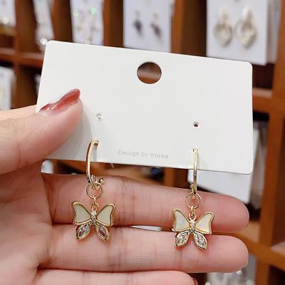 China 2020 new temperament butterfly earrings cute personality ear hook dangling female earrings long for sale