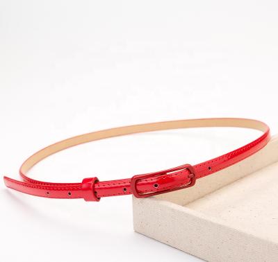 China Durable Leisure Belt 20MM New Style Alloy Buckles Thin Jeans Fashion Red PU Leather Belt For Women for sale