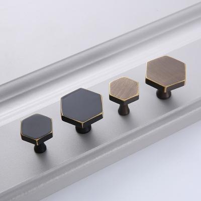 China Wonderful Electroplating Brass Single Drawer Knobs Hexagon Hole Kitchen Cupboard Cupboard Knobs For Furniture Hardware for sale