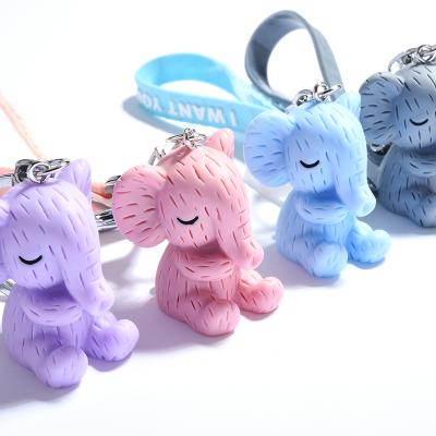 China Fashionable Resin Elephant Key Chain Purse Handbag Hanger Couple Car Bag Key Ring Animal 3D Cartoon Elephant Key Chain for sale