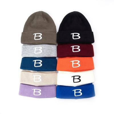 China Designer Acrylic Winter Warm Tank Top JOINT Embroidery Knitted Beanies Hats for sale