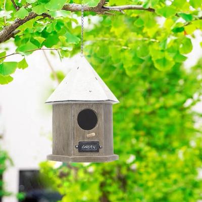 China DIY Garden Decoration Bird Box Nesting House Wholesale Sustainable Durable Nature Resin Hanging House Outside Design Pattern Wood for sale