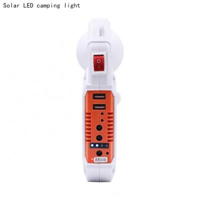 China Portable Solar Spotlight Emergency Camping Light Rechargeable Led Torch Light For Camping for sale