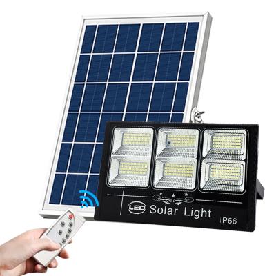 China High Quality Portable Outdoor Waterproof Rechargeable Garden Floodlight Ip65 100W 200W 300W Solar Led Flood Light for sale