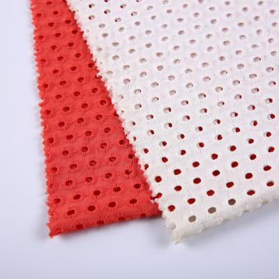 China Fashion newcomers wholesale red eyelet voile cotton embroidery lace fabric with hole for clothing for sale