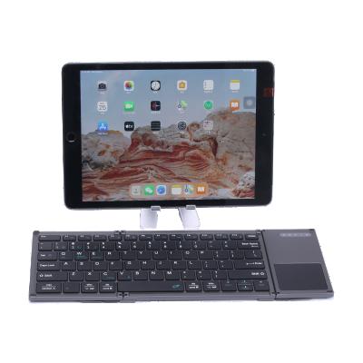 China Mini Bluetooth Anti-ghosting Slim Foldable Wireless Keyboard Portable Triple Foldable Keyboard Wireless Set for sale