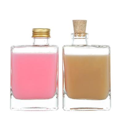 China 280ml Beverage Square Milk Glass Bottles With Cork For Juice Beer Wine Champagne Smoothies Soda Liquor Beverage for sale